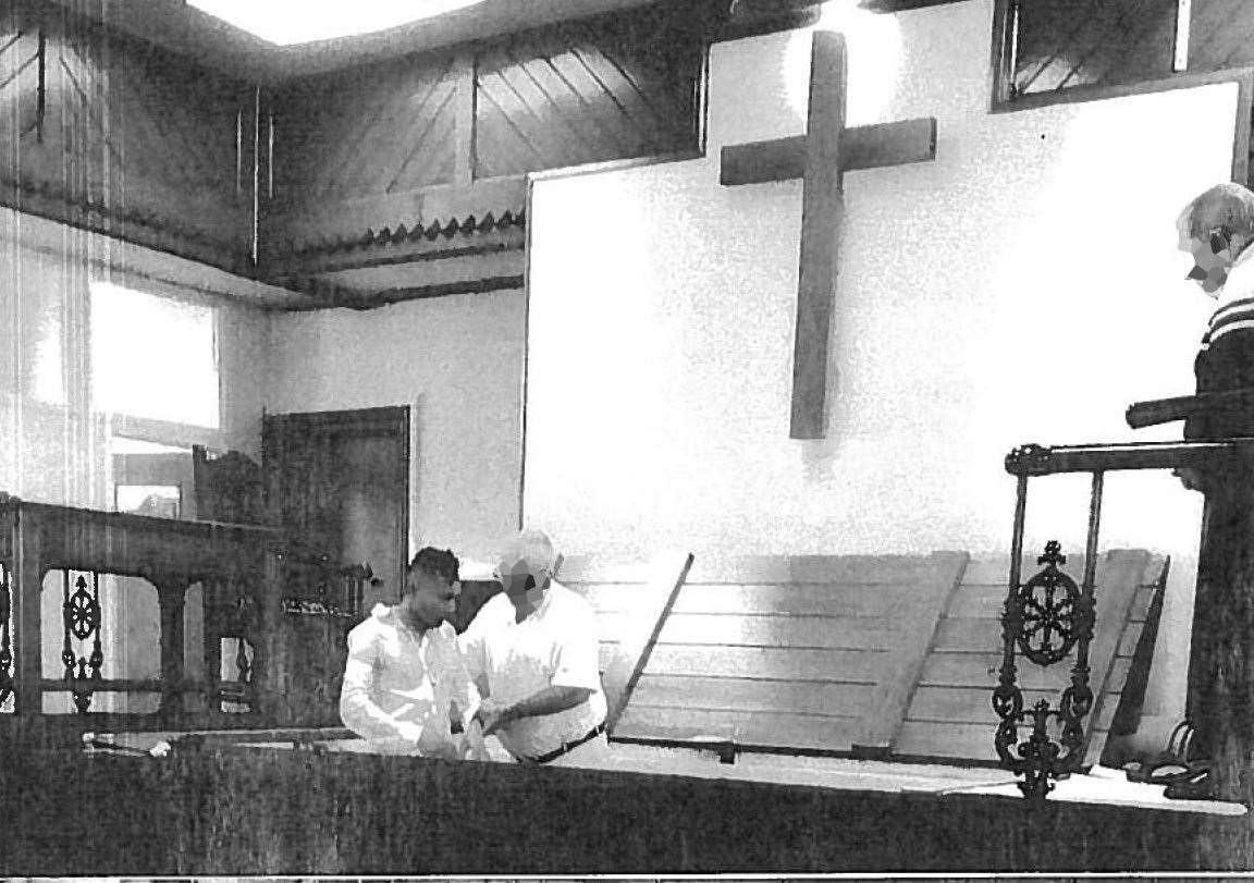 Abdul Ezedi (left) being baptised (Judicial Office/PA)