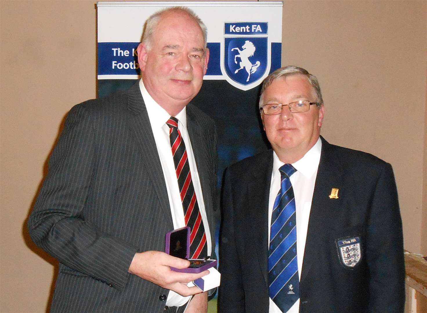 Peter Danzey receives his FA 50-year long service award in 2013. Picture: Andy Fairhurst