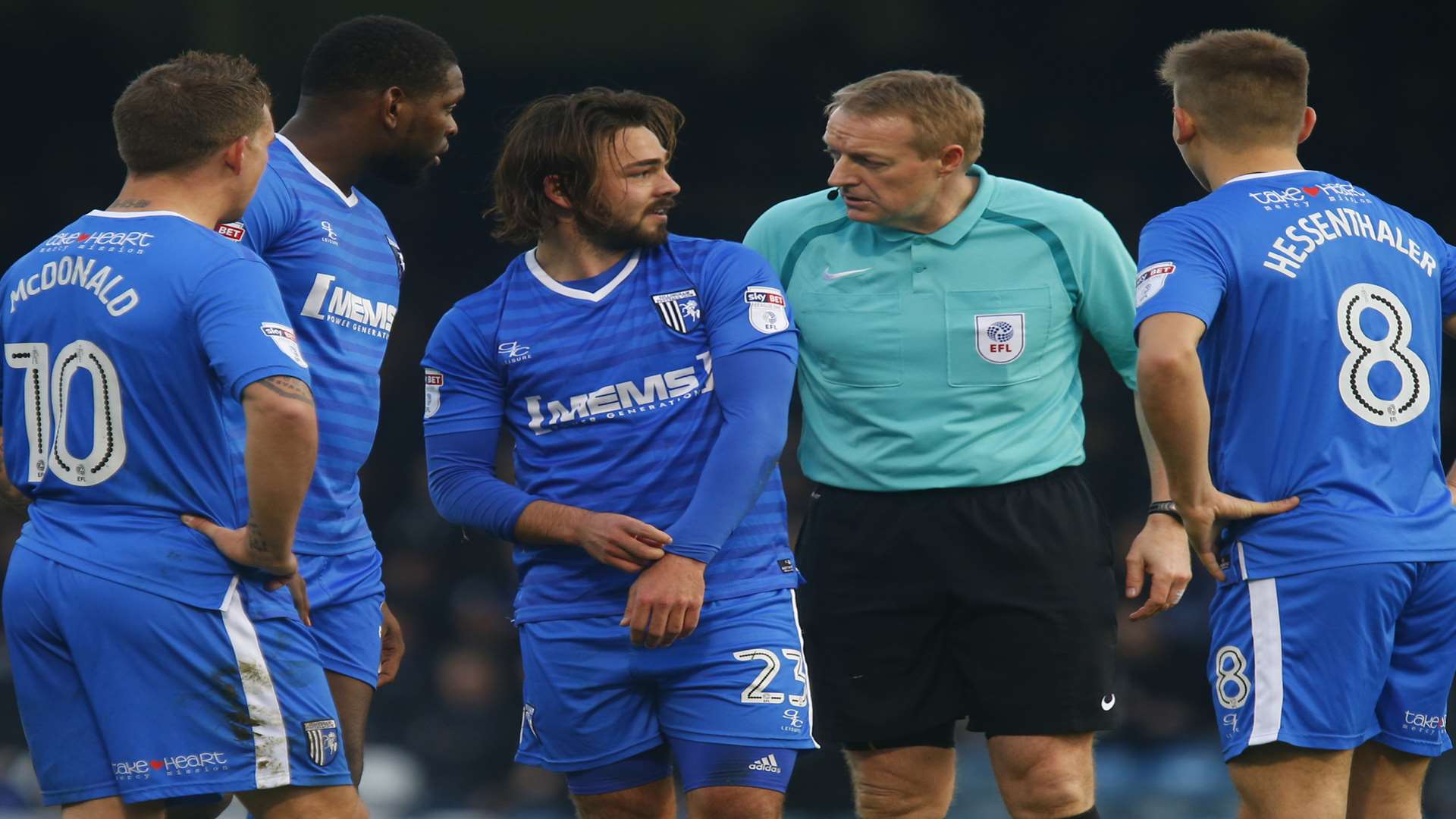 Bradley Dack and referee Kettle in discussion Picture: Andy Jones