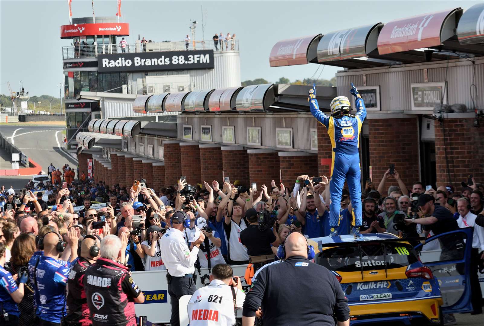 Four-time champion Sutton celebrates his first BTCC title in front-wheel-drive machinery. Picture: Simon Hildrew