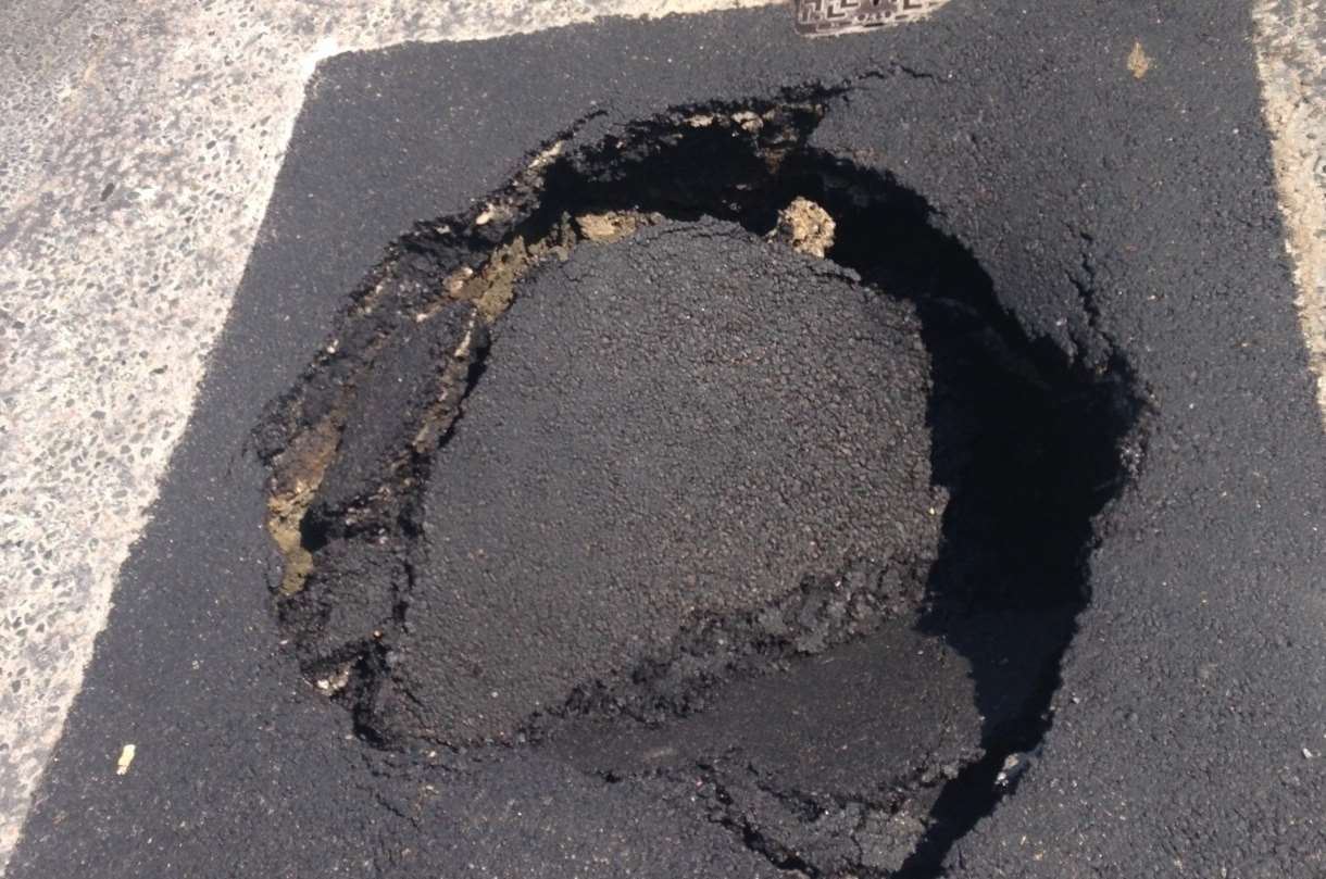 A pothole had initially been repaired, but it has since collapsed in on itself Picture: Nathan Kelsey