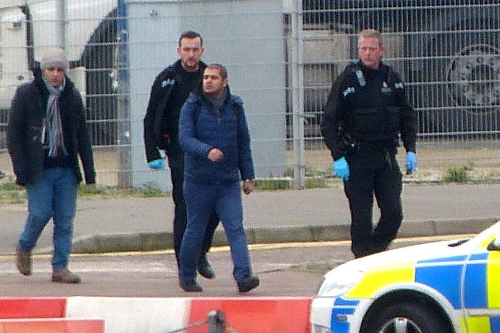 Two men are led away by police in Folkestone yesterday. Picture @kent_999s