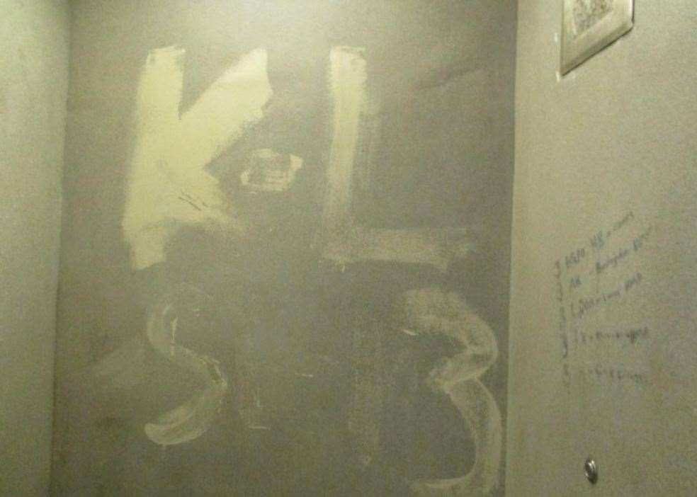 Graffiti in one of the showers. Picture: HM Chief Inspector of Prisons