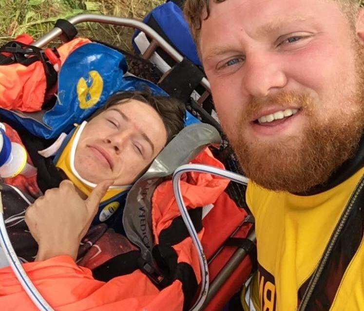 Logan with crewman Luke during the rescue