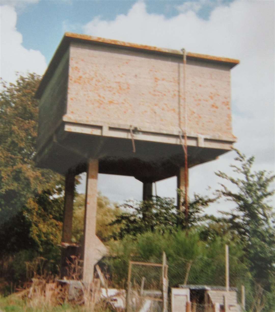 This concrete water tower was described by Kevin McCloud as "an ugly brute" before it was transformed in to a modern and sleek home