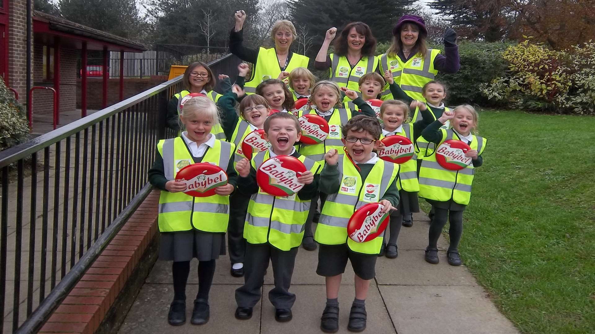 Walk to school coordinator Alicia Martineau (centre, back row), colleagues and pupils celebrate the launch of a walking bus at Goudhurst and Kilndown CE Primary School.