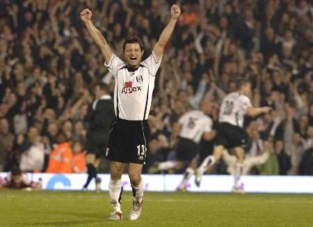IT'S VIRTUALLY ALL OVER: Tomasz Radzinski celebrates Fulham's second goal by Claus Jensen. Picture: MATT WALKER