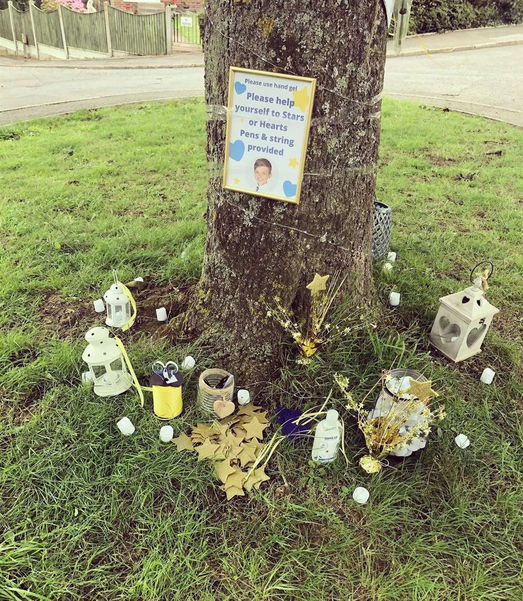 Candles and messages to Josh Harber have been placed at the tree throughout the day ahead of a vigil tonight Picture: Danielle Harber