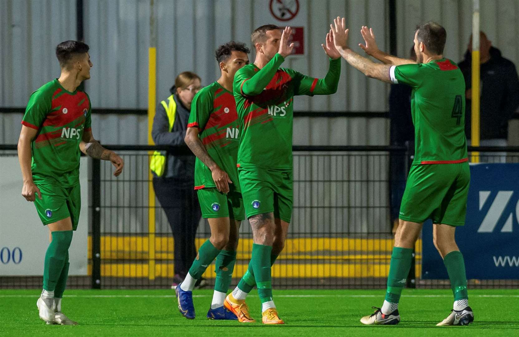 Lydd Town celebrate one of their goals as they win 4-2 at Faversham on Tuesday to complete a Southern Counties East Premier Division double over them. Picture: Ian Scammell