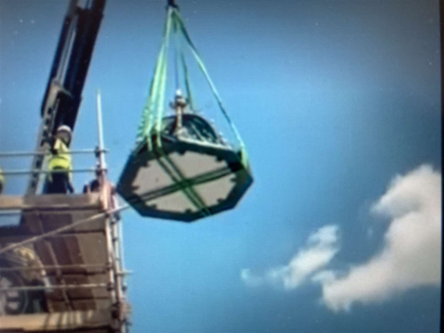 Easy does it. The top of the clock tower is lifted into position in Sheerness. Picture: Ray Featherstone