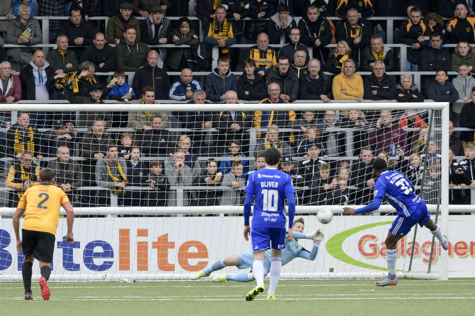 Lee Worgan saves Mike Fondop-Talom's late penalty Picture: Andy Payton