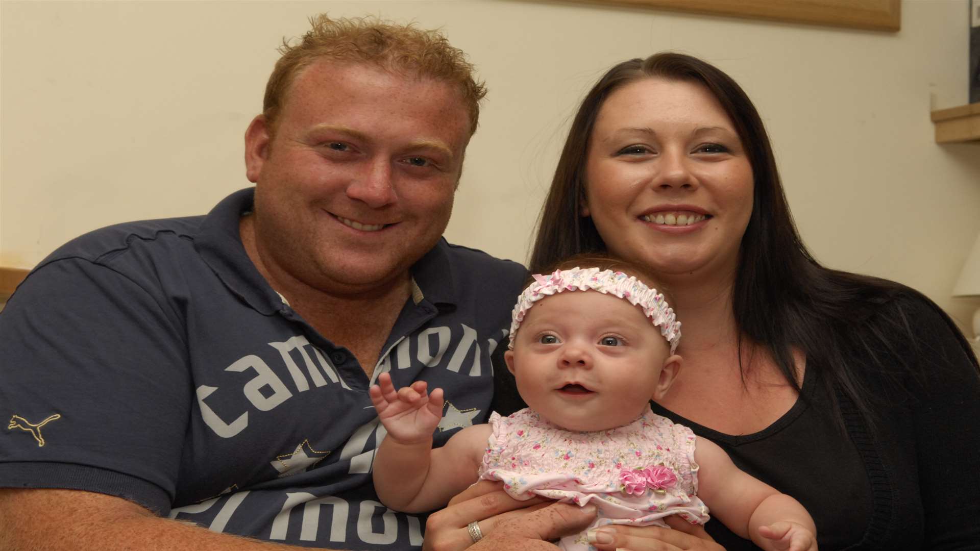 David "Dazy" Saunders and his wife, Kelly, with their daughter Daisy-Mae, who suffered from meningitis as a baby
