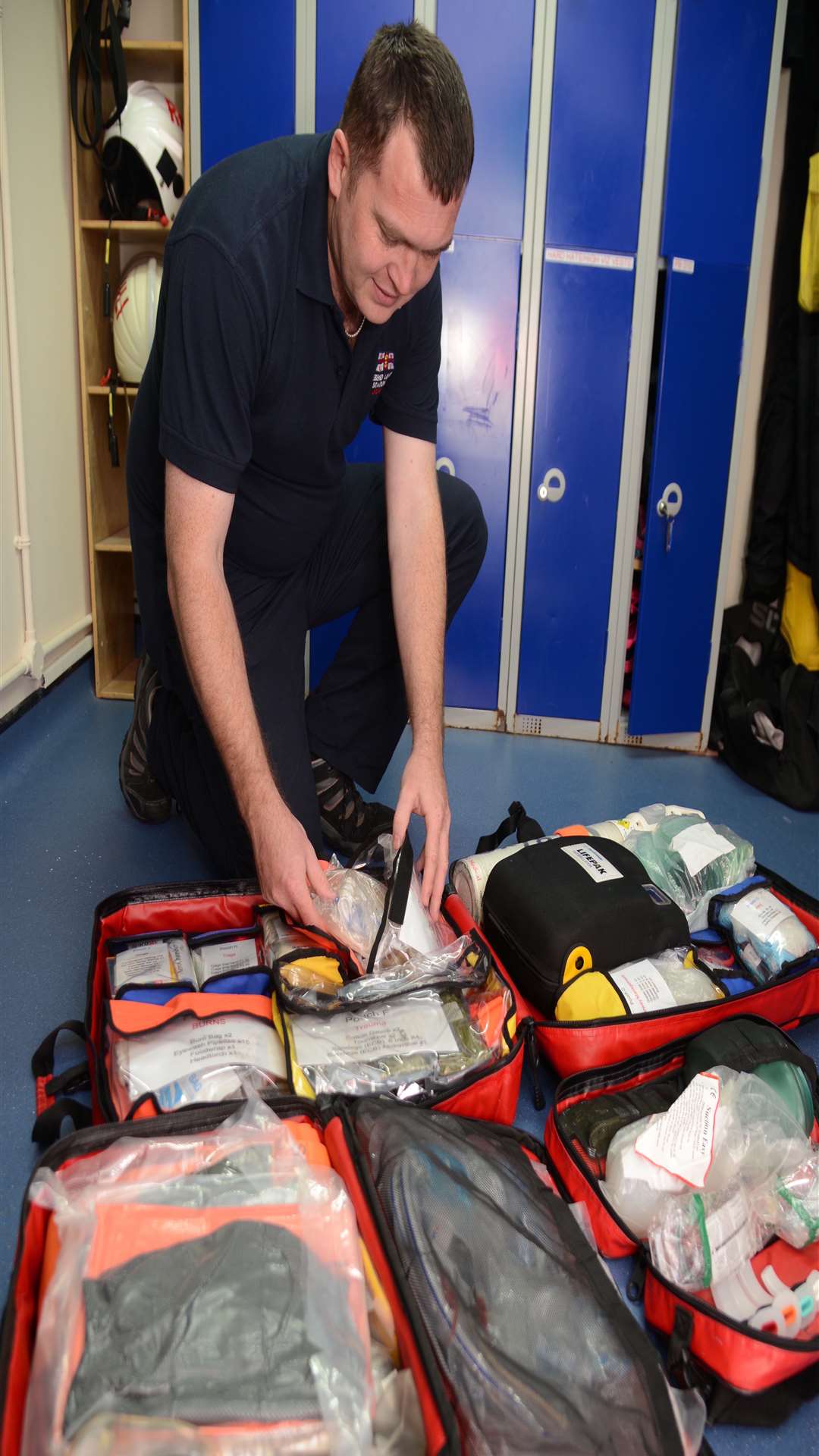 Volunteer Stewart Challis checking the Casualty Care Kit