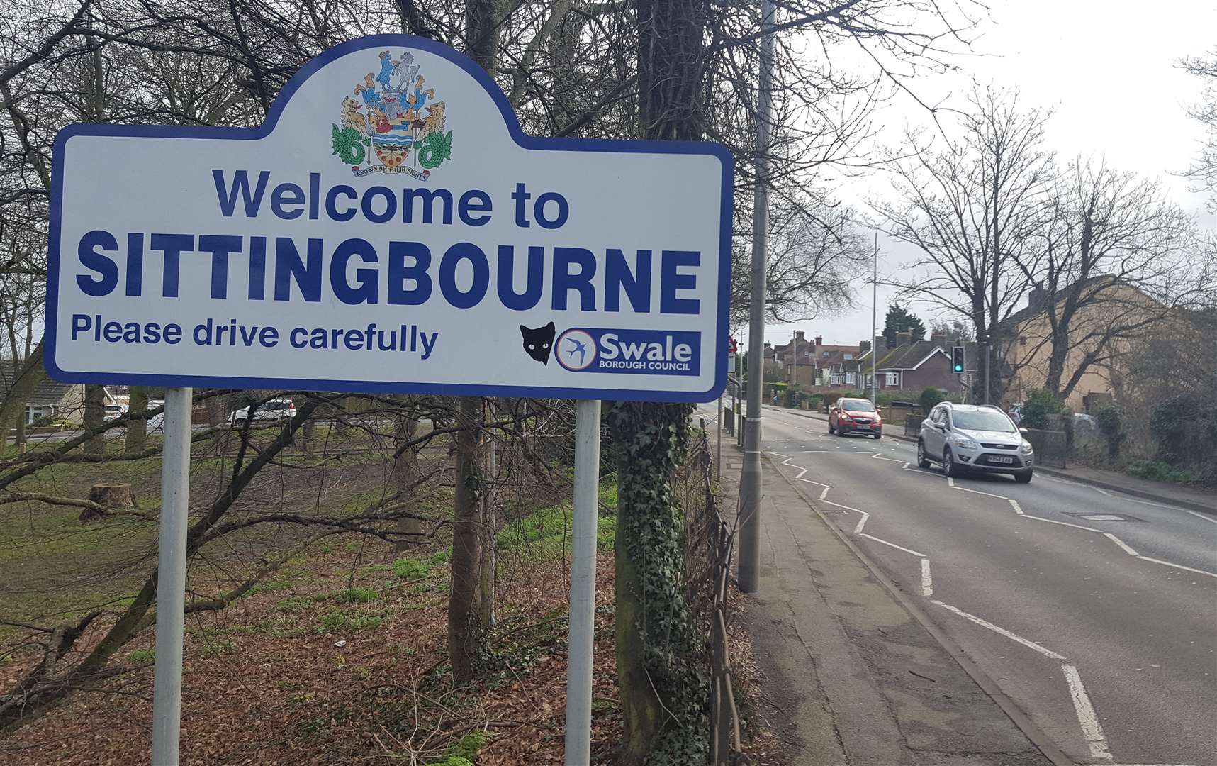 The cat was spotted on a sign in Sittingbourne