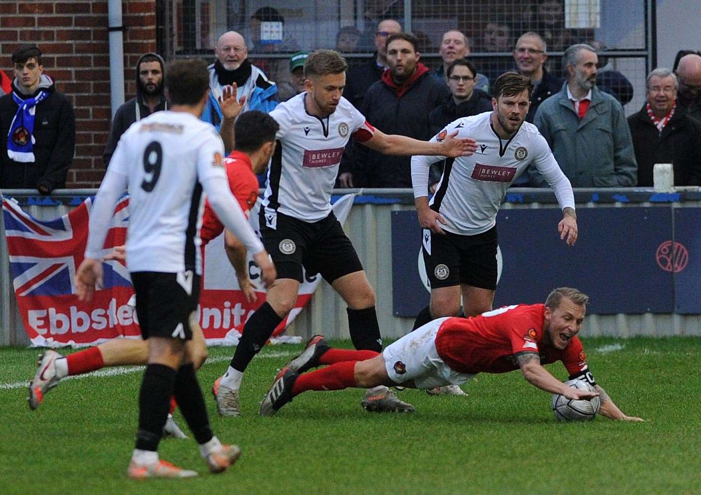Ebbsfleet skipper Chris Solly is floored during Saturday's win at Hungerford.