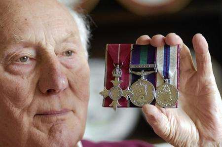 John Olley with his medals, returned after 18 years