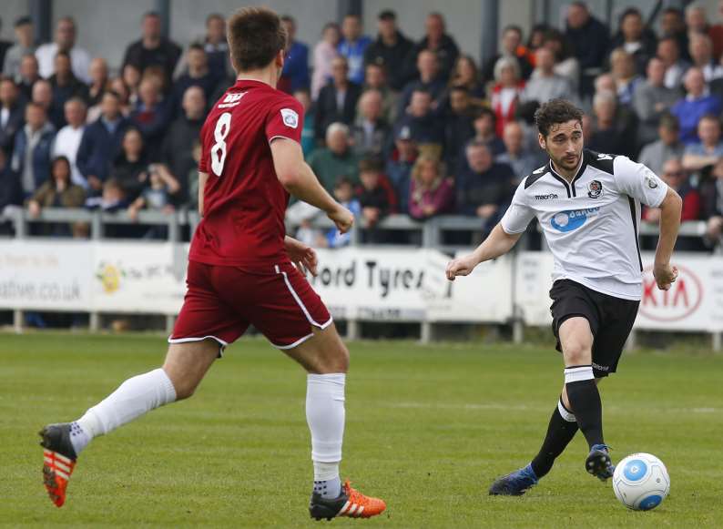 Dartford's Alex Brown picks out a forward pass against Chelmsford. Picture: Andy Jones
