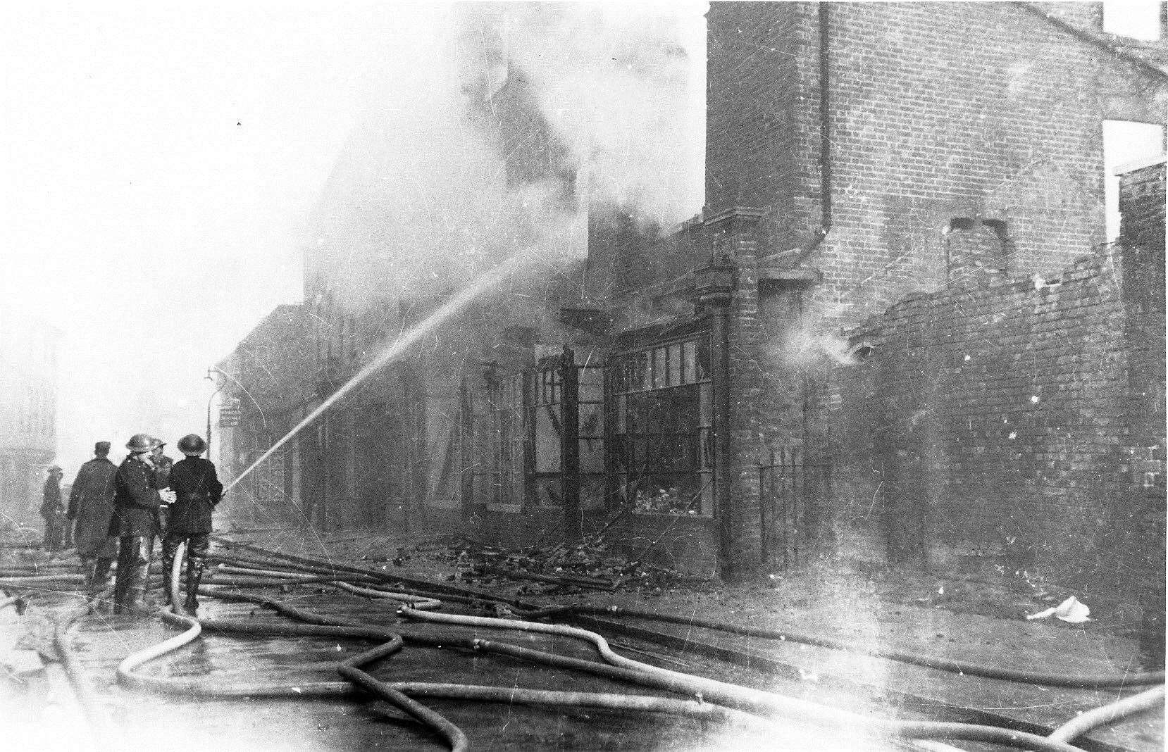 Firemen tackle the blaze in Starr's House, during the early hours of June 1, 1942. Picture: Paul Crampton