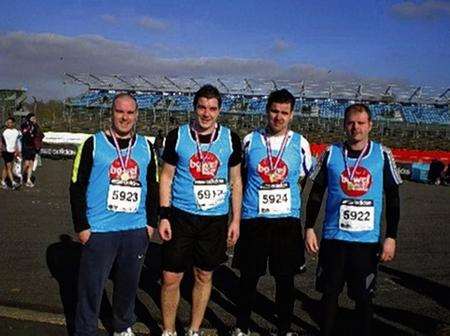 Matt and Dean George with cousin Paul Mawhinney and friend Daniel Baker who took part in a half marathon at Silverstone