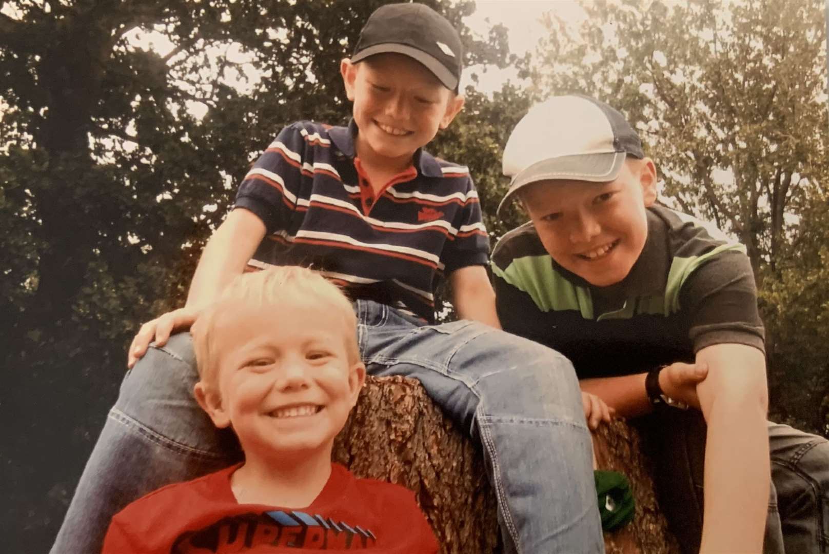 Matthew Mackell with his older brother Christopher and younger brother Daniel. Picture: Michael Bond