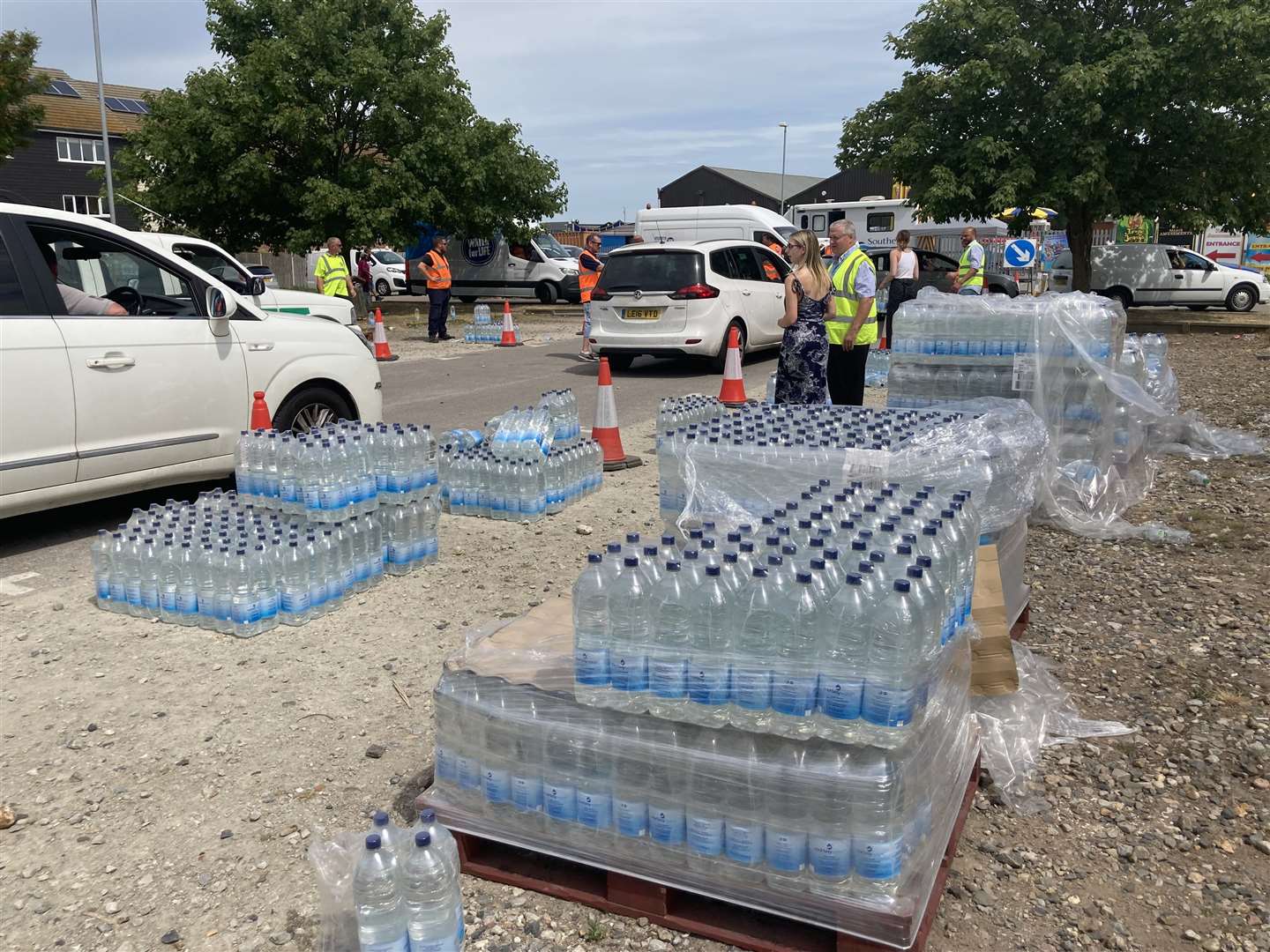 Hundreds of people arriving at the Leysdown emergency water collection point as Southern Water provide 350,000 litres of bottled supplies to customers