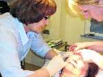 Patricia Webster is injected with botox by consultant nurse Margaret Gurney and clinical support worker Sarah Kelly