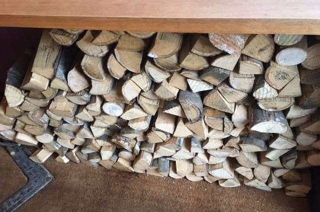 I didn’t spot a log burner or open fire but this tell-tale pile of logs suggests there must be a fire for the colder winter months