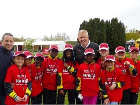 St Peter's pupils and teacher Stephen Tierney with veteran pro golfer Colin Montgomerie.