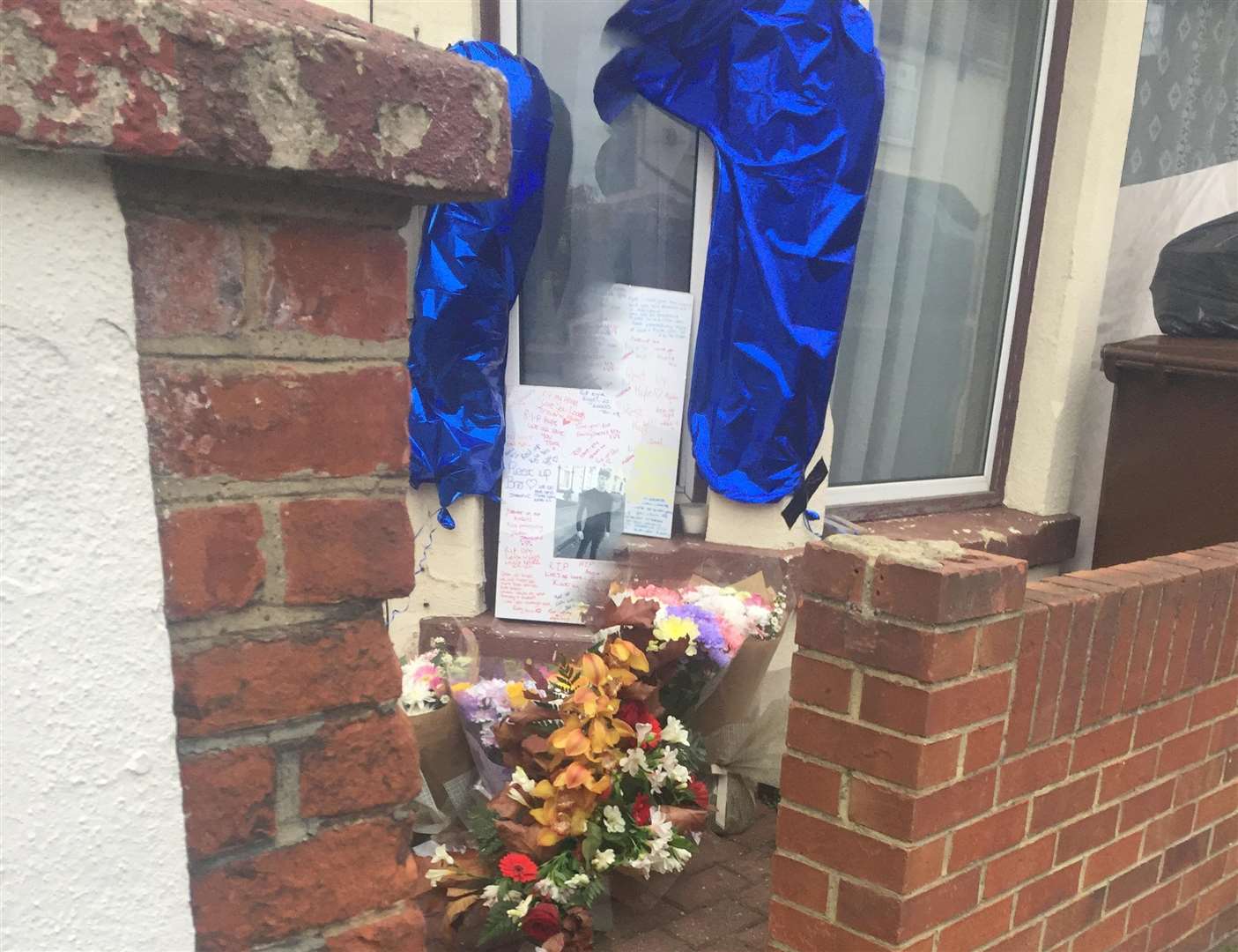 A shrine set up in memory of Kyle Yule outside his home