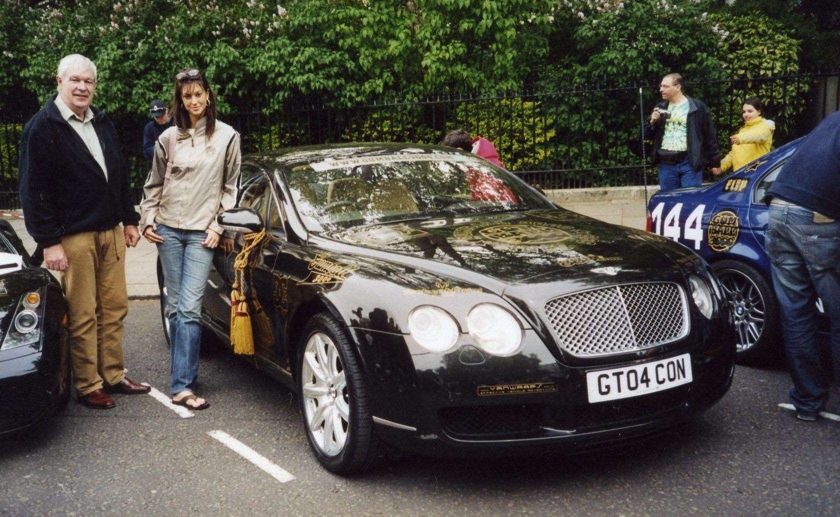 Emma Scott pictured in 2005 with her father David and the Bentley Continental GT in which she took part in