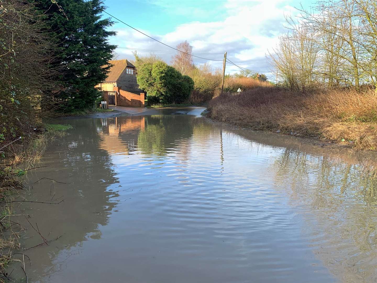 Church Road in Sevington is badly flooded