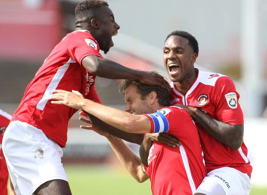 Chris Sessegnon and Aiden Palmer celebrate with goal scorer Daryl McMahon Picture: John Westhrop