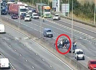 A car flipped onto its roof in the inside lane. Picture: Highways England