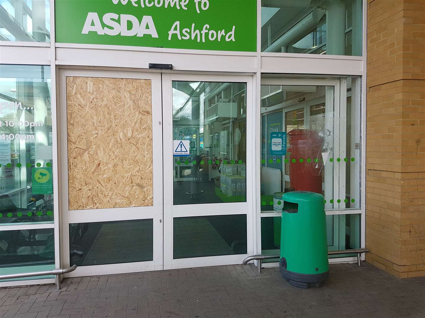 An Asda window has been boarded up after it was smashed last night (14841075)