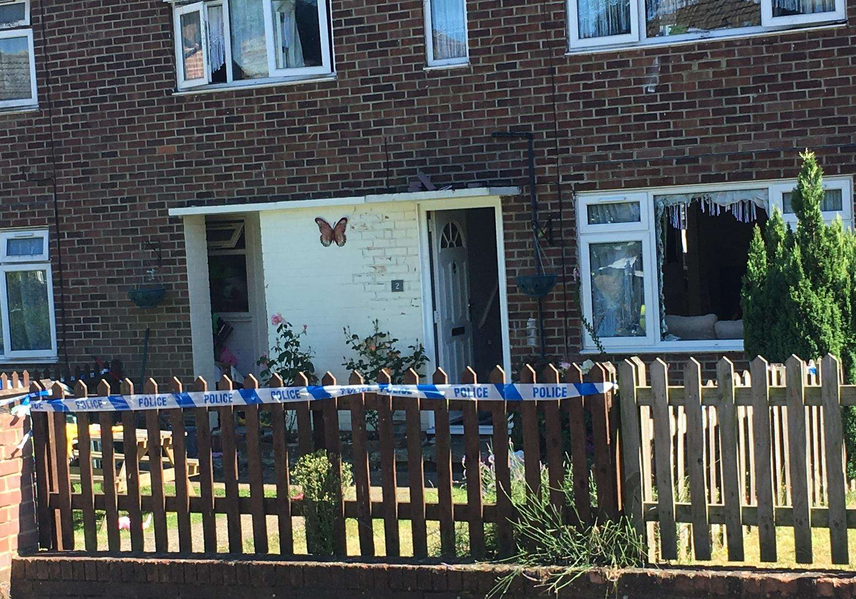 A smashed window at the house were the altercation allegedly happened