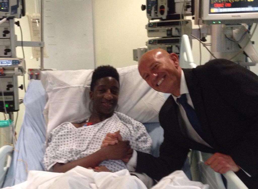 Ali Reith was paid a visit by Darts youth development coach Phil Murray who was one of first on hand when he collapsed at Princes Park late last month. Picture: Dartford FC