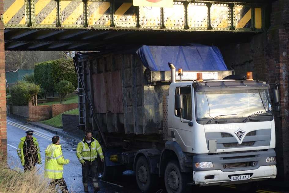 The lorry stuck under the Chart Road bridge. Picture: Gary Browne