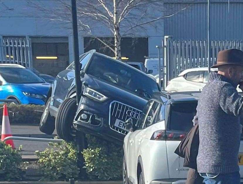 Crashed Audi stuck on a lampost in the Maidstone Industrial Estate. Picture: David Simon Turner
