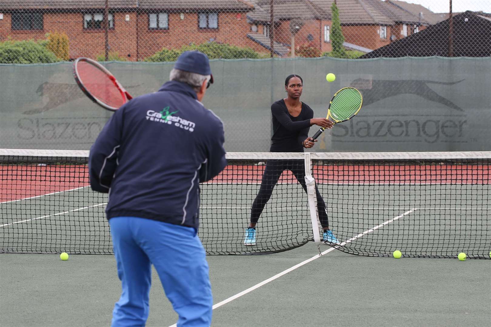 Club member Isabelle Eustache playing with Gravesham Tennis Club's head coach Michel Suleau on Wednesday. Picture: Rob Powell / rob@uretopia.com (34675140)