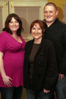 Antenatal teacher Rachel Stead with her 1,000th couple - Alison and David Gore