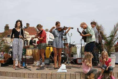 Cocos Lovers performing on Deal Seafront