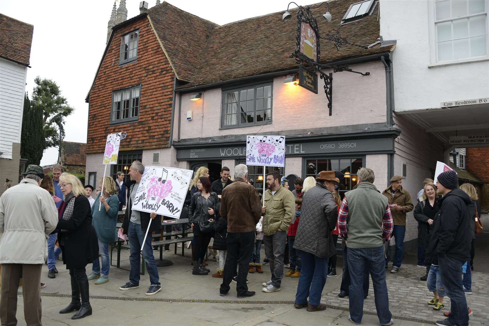 Protesters at The Woolpack complaining that the right to hold music events at the barn was withdrawn. Picture: Paul Amos