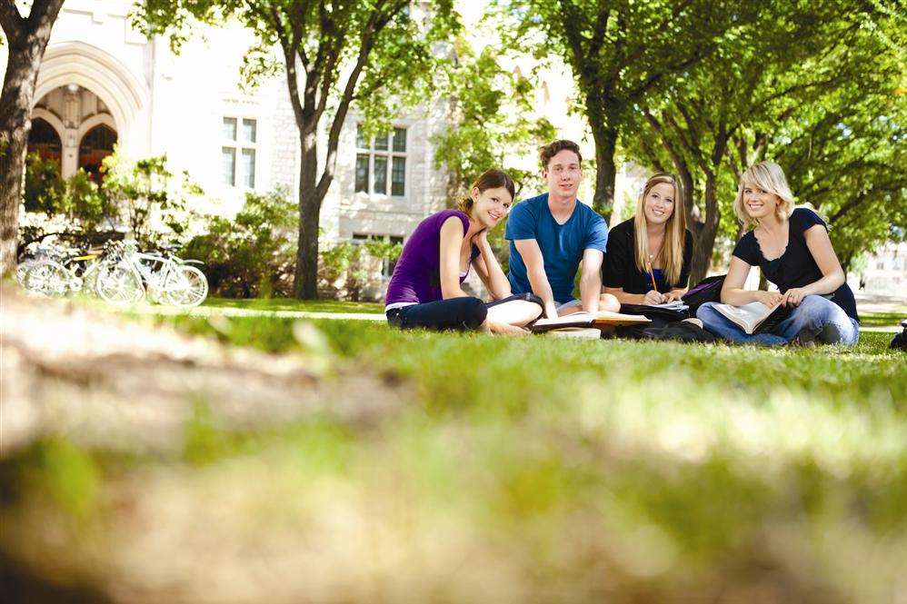 Students on campus. Library picture