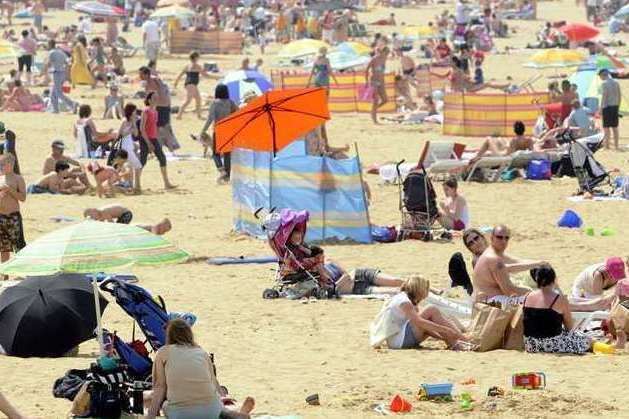 People enjoying the sun on Margate beach