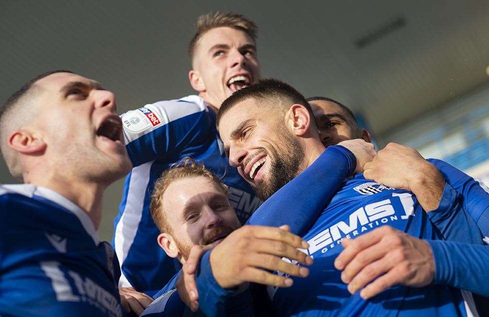 Gillingham players celebrate with goalscorer Max Ehmer after going 3-1 up Picture: Ady Kerry (24847938)