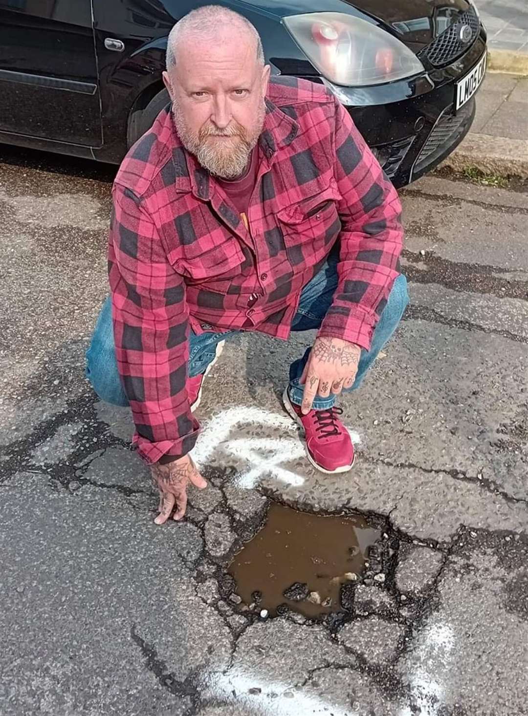 Ian Maggs, 58, has vowed to fill the potholes in Cowper Road himself if the council do not come to fix them soon