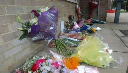 Floral tributes outside Tonbridge Fire Station. Picture: MATT WALKER
