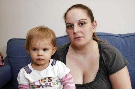 Ruby Collier cut her mouth on a toy trumpet bought from Argos. Ruby with her mum Sophie Dunham.