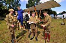 The Oily Rags, a Great War re-enactors group, beside their Nieuport 12 at the Sky Sheppey celebrations