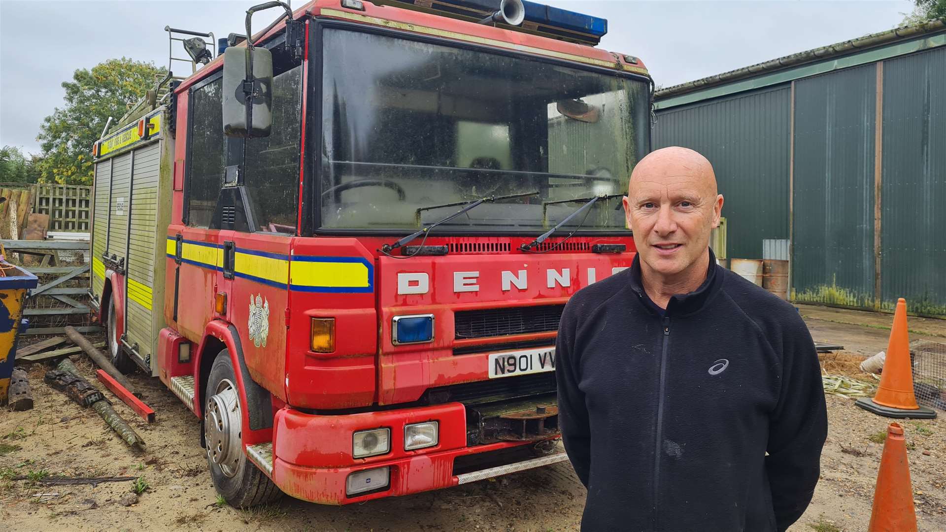 Kris Saxby with his 1994 Dennis fire engine he is selling